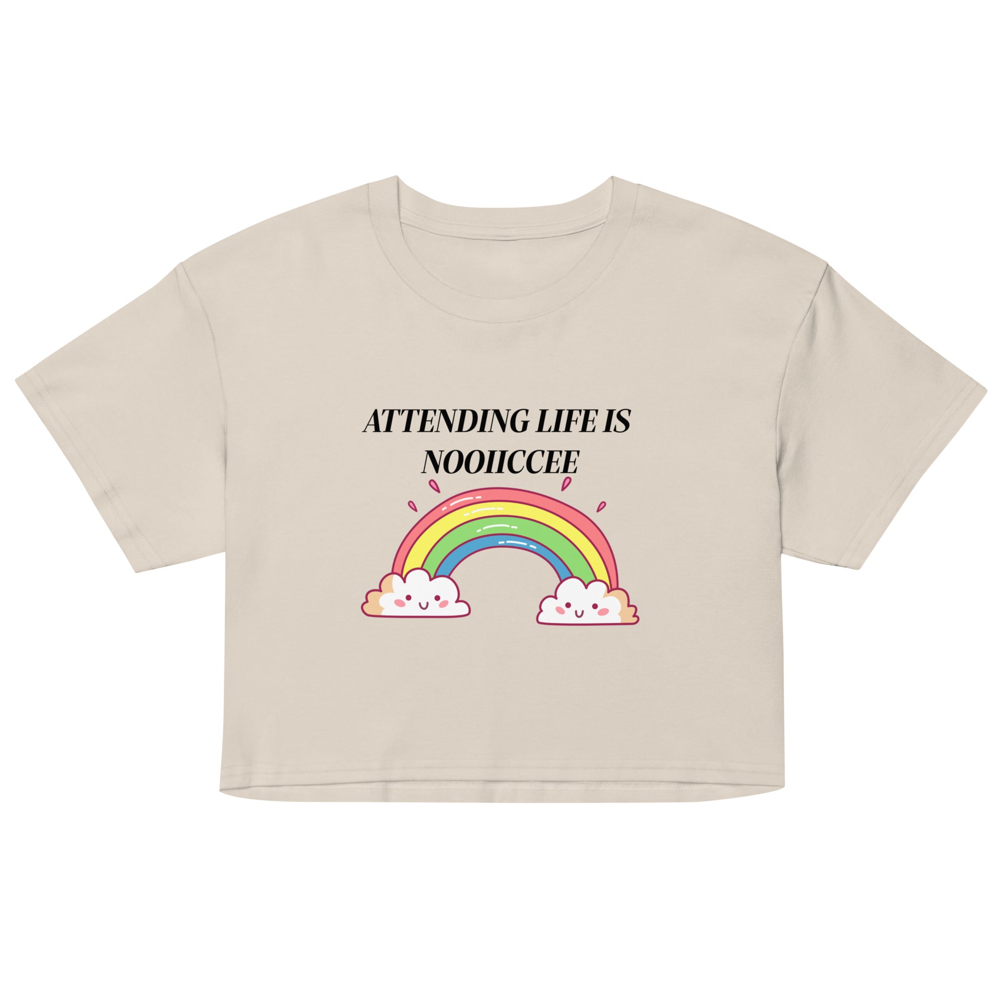 Bone women’s cropped t-shirt with the Attending life is nooiiccee rainbow design, front view.